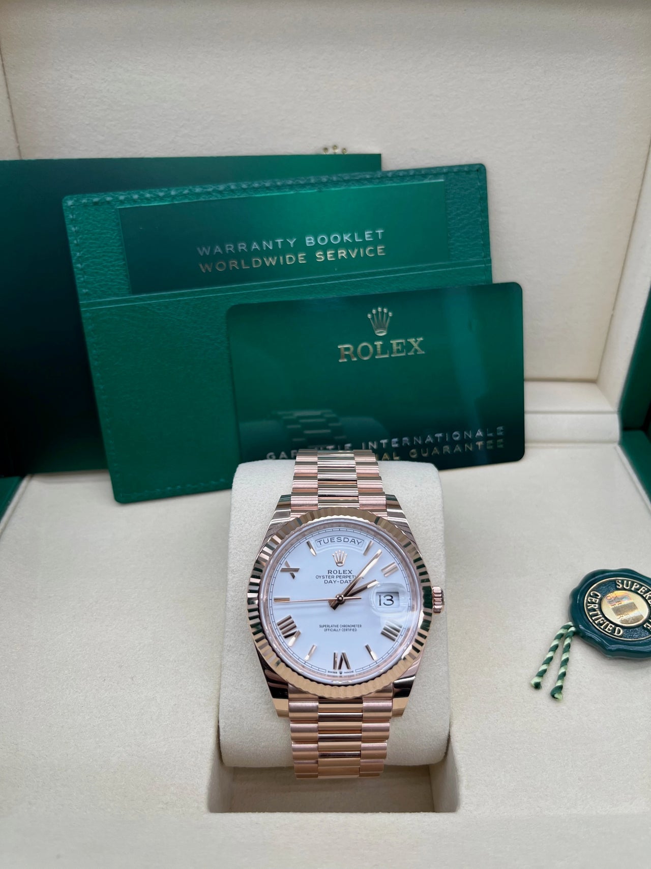 Day-Date 40 White Roman Everose President  White Against Rose Gold.