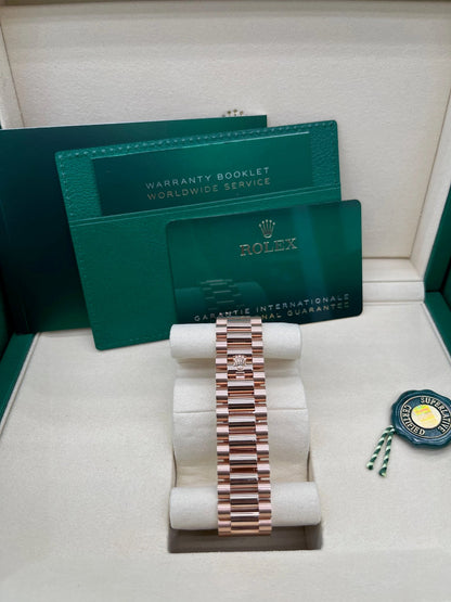 Day-Date 40 White Roman Everose President  White Against Rose Gold.