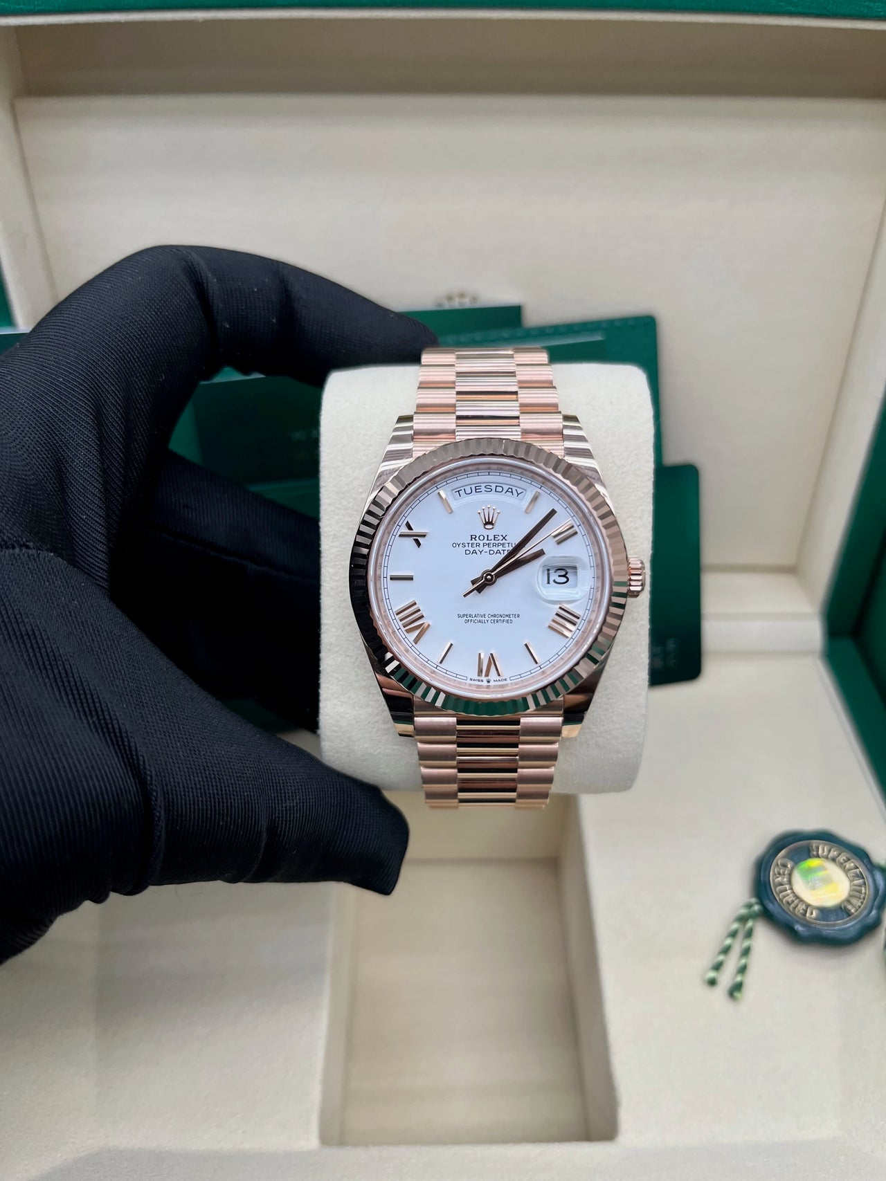Day-Date 40 White Roman Everose President  White Against Rose Gold.