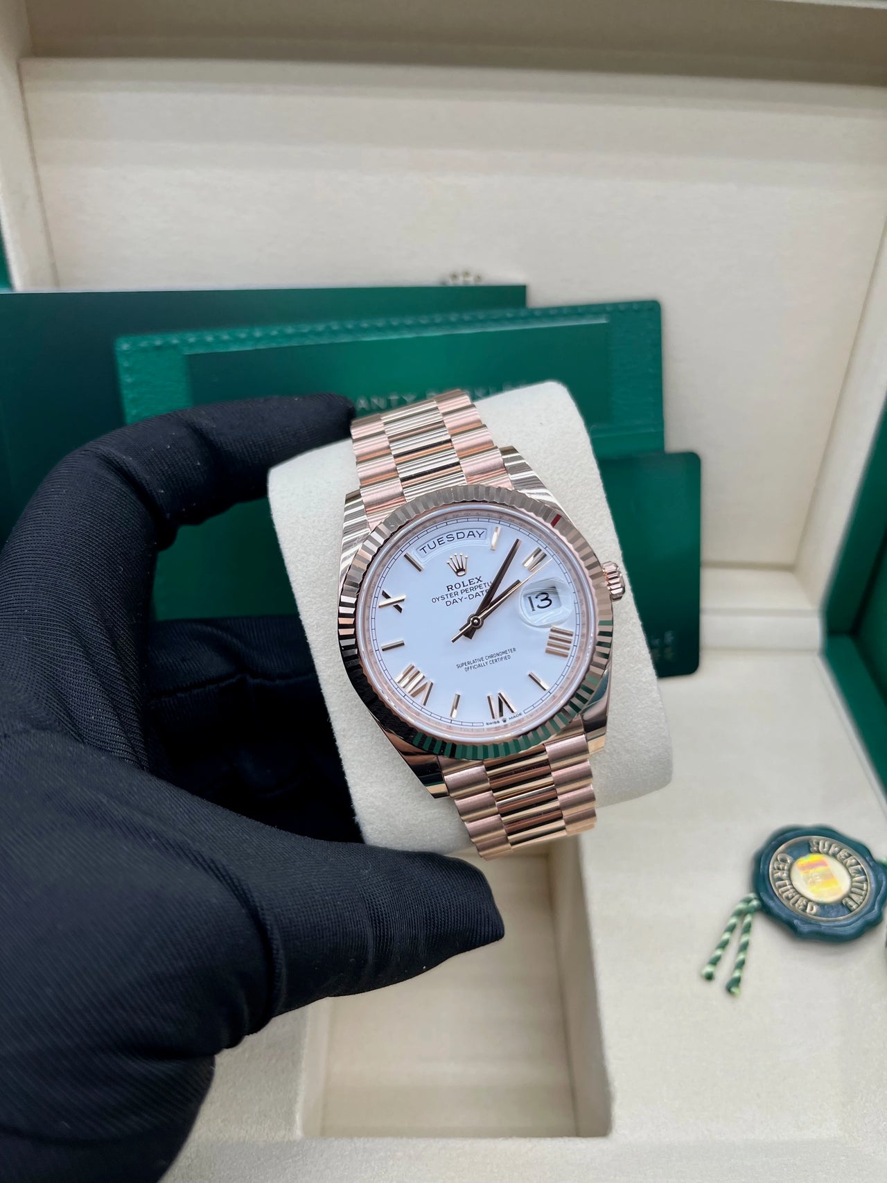 Day-Date 40 White Roman Everose President  White Against Rose Gold.