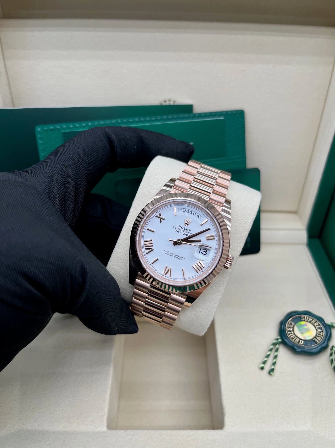 Day-Date 40 White Roman Everose President  White Against Rose Gold.