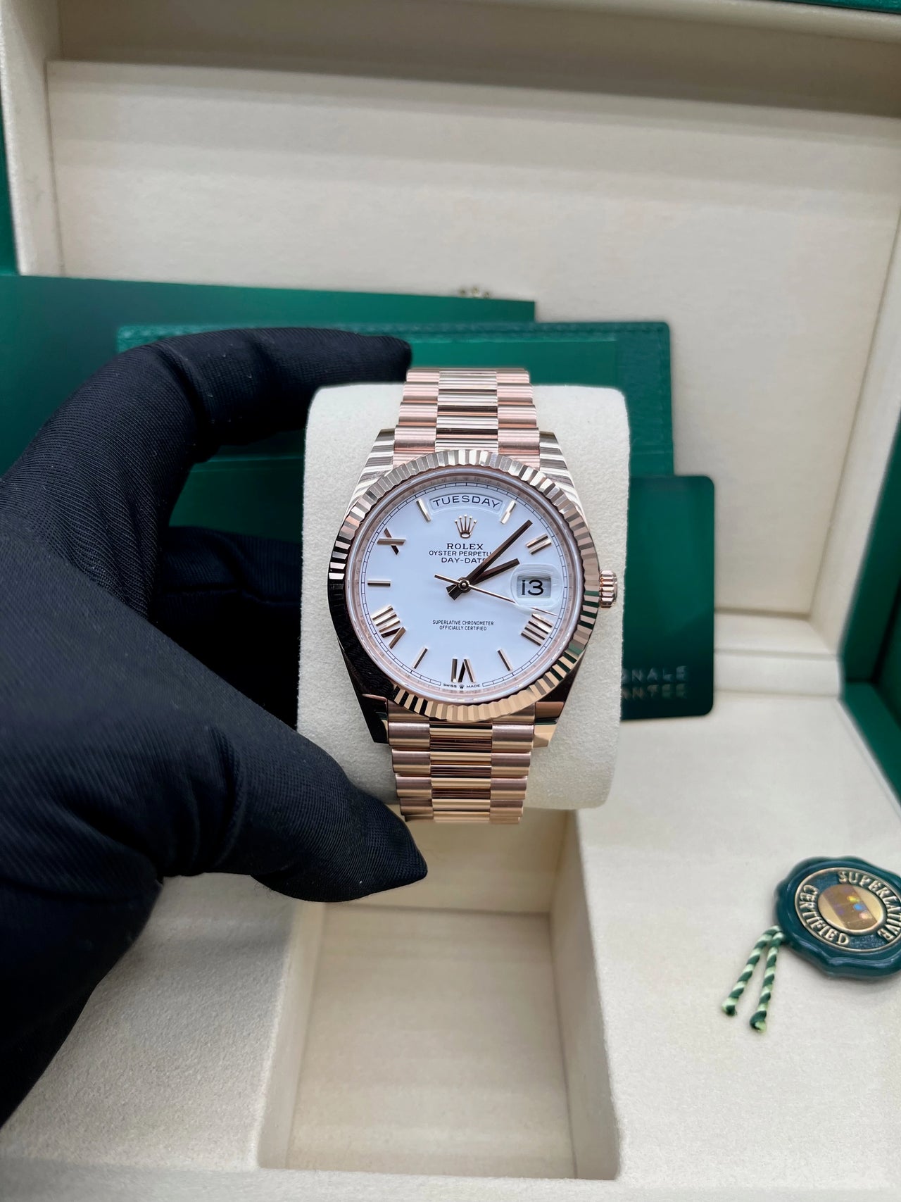Day-Date 40 White Roman Everose President  White Against Rose Gold.