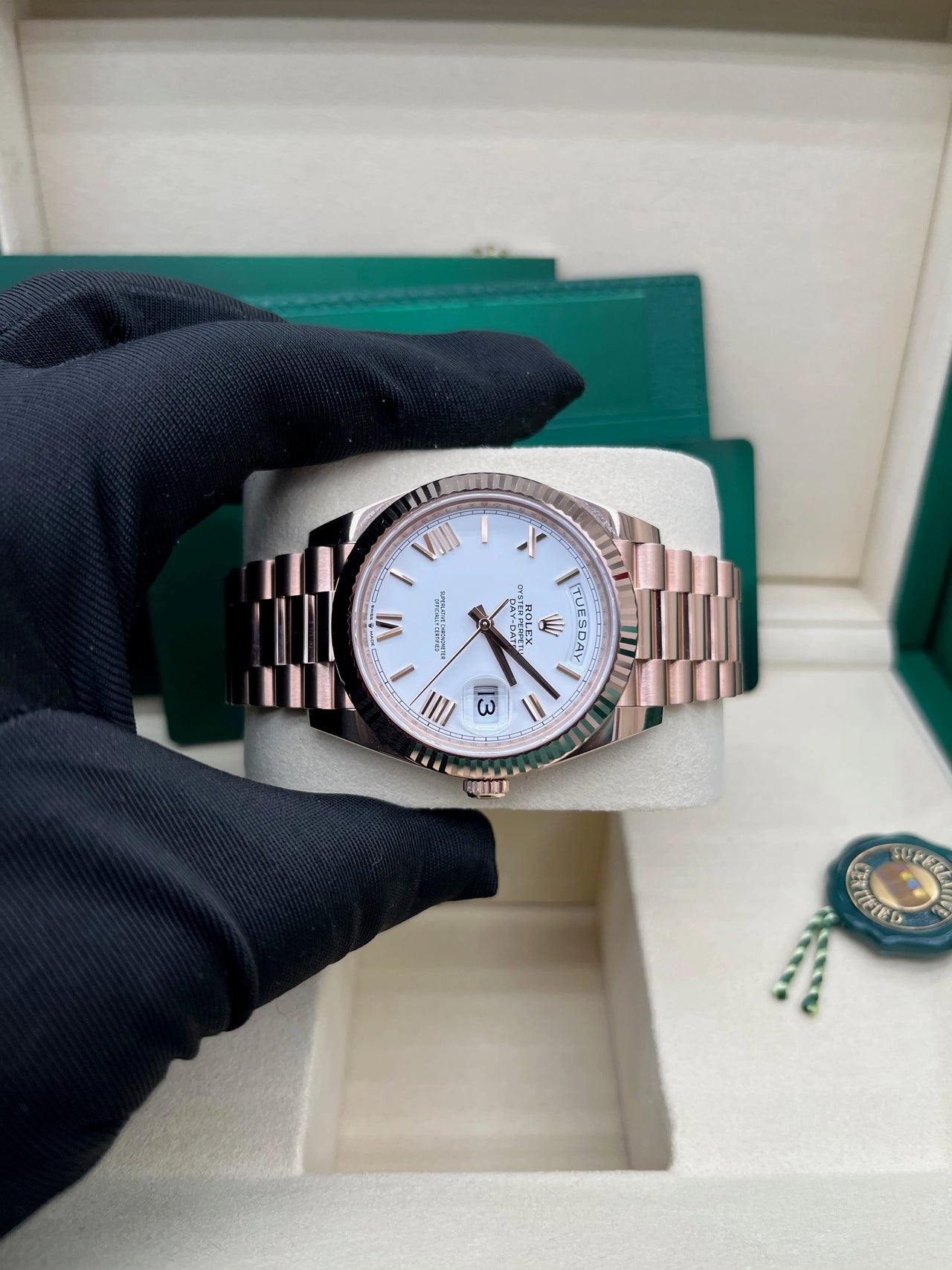 Day-Date 40 White Roman Everose President  White Against Rose Gold.